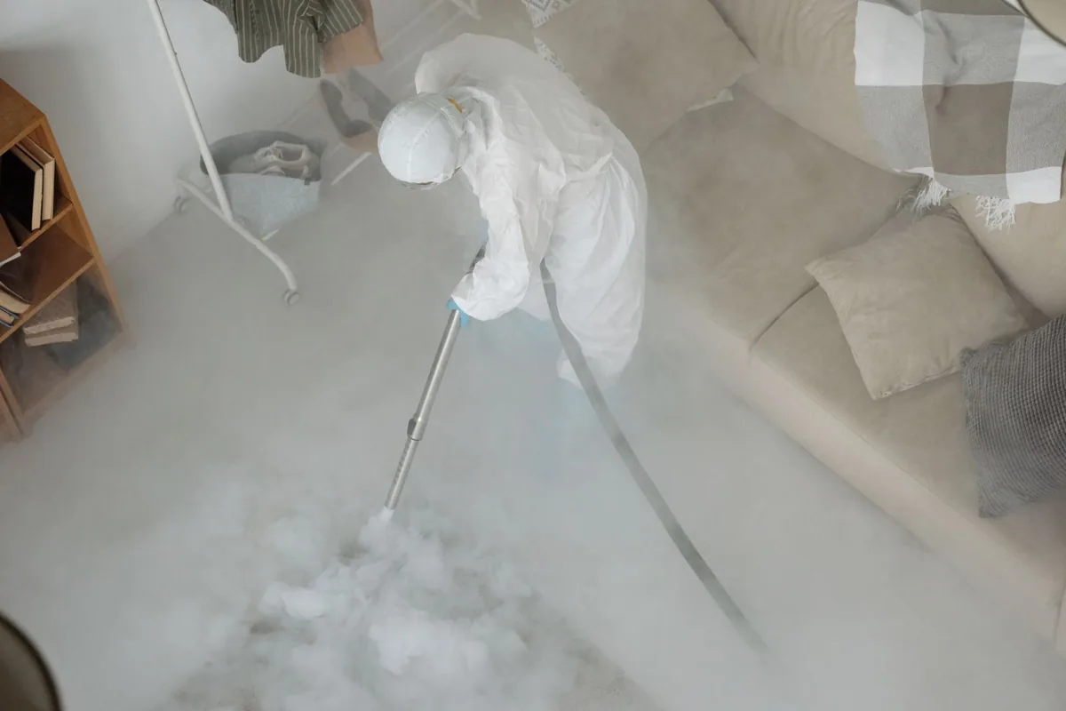 Biohazard cleanup technician in protective equipment, Noroton Heights, CT